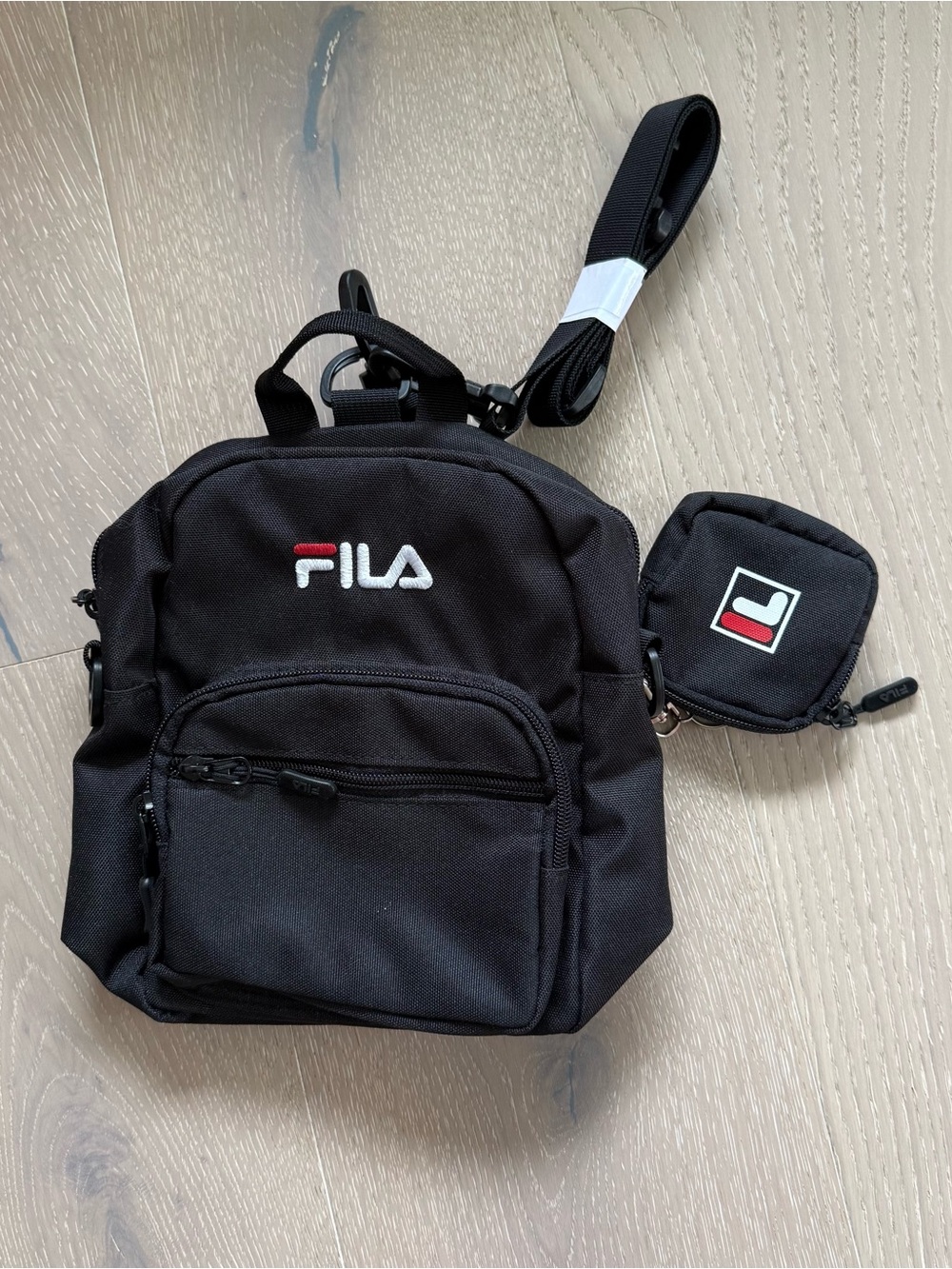 FILA Black Mini Backpack Bag with Detachable Straps and Pouch; Multi wear style